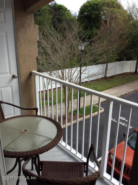 7920 Merrill Road, Unit 1009 Jacksonville, FL 32277 - Photo 17 of 22 a view of a balcony dining area