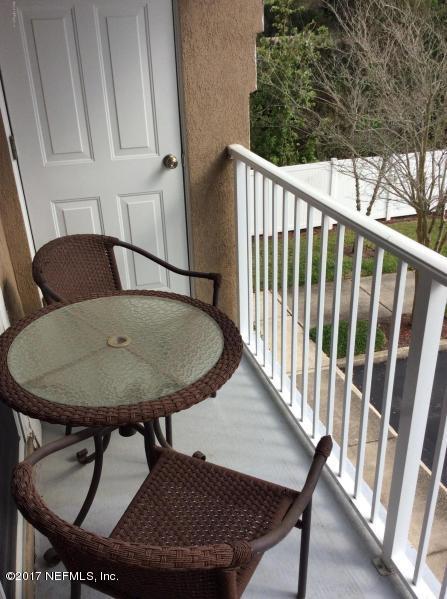 7920 Merrill Road, Unit 1009 Jacksonville, FL 32277 - Photo 18 of 22 a view of a balcony dining area