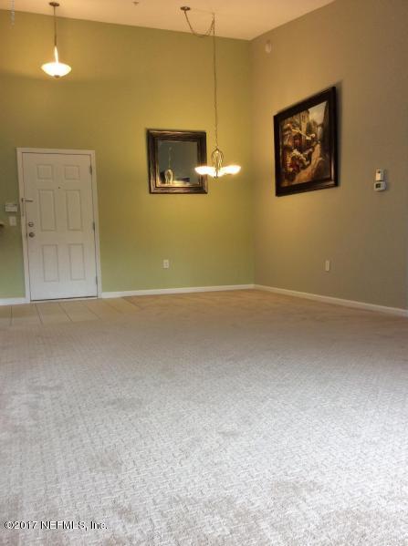 7920 Merrill Road, Unit 1009 Jacksonville, FL 32277 - Photo 5 of 22 a view of a room with window