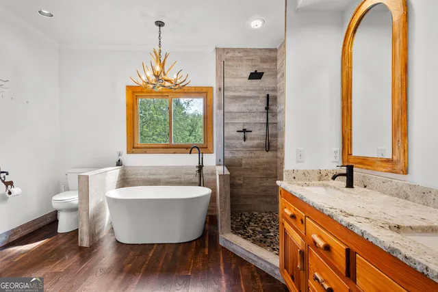 a view of an empty room with a fireplace