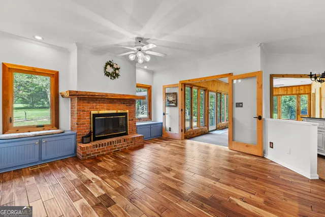 a kitchen with a sink stove and microwave