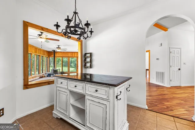 a view of a swimming pool with a sitting area