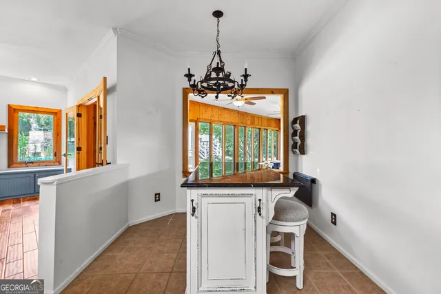 a view of house with backyard outdoor seating and green space