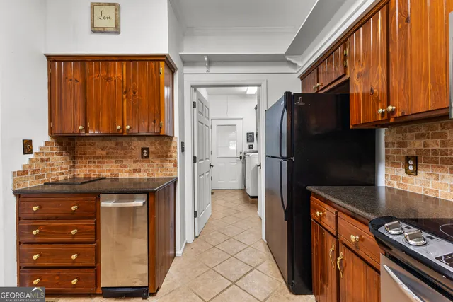 a view of sitting area with furniture and wooden deck