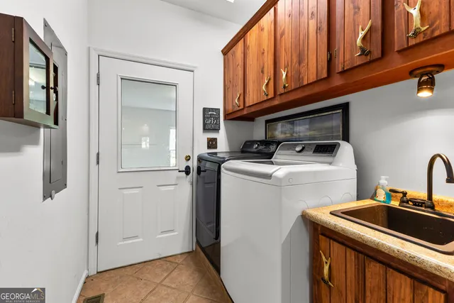 a view of a patio with a table chairs and wooden floor