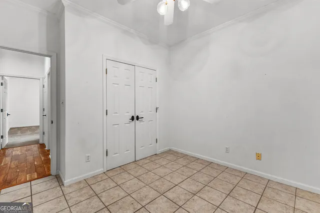 a view of a house with a yard and garage