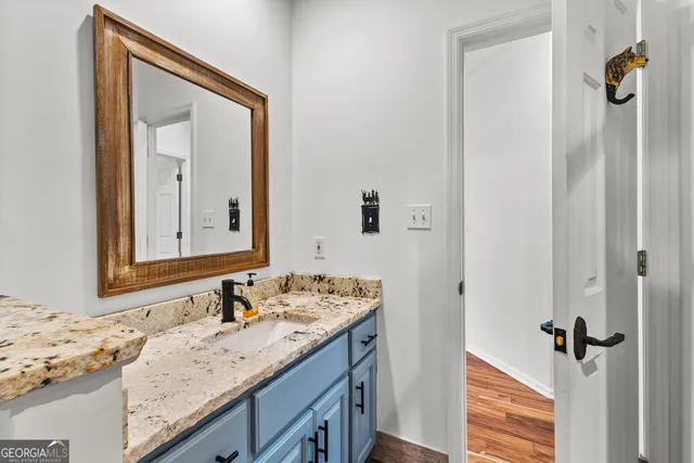 a house with swimming pool in front of it