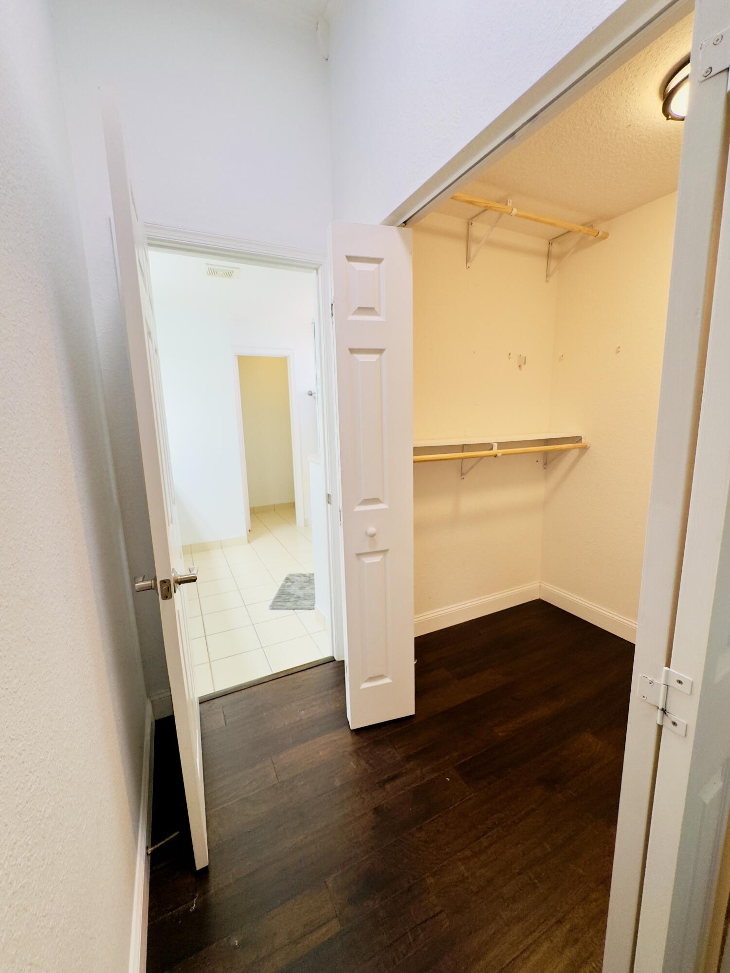 11479 Southwest Glengarry Court Port St. Lucie, FL 34987 - Photo 18 of 24 wooden floor in an empty room