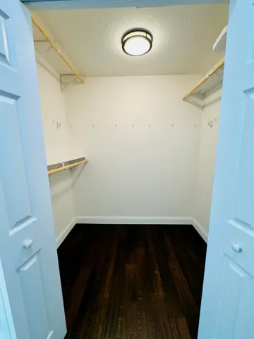 a bathroom with a bathtub a sink and a mirror