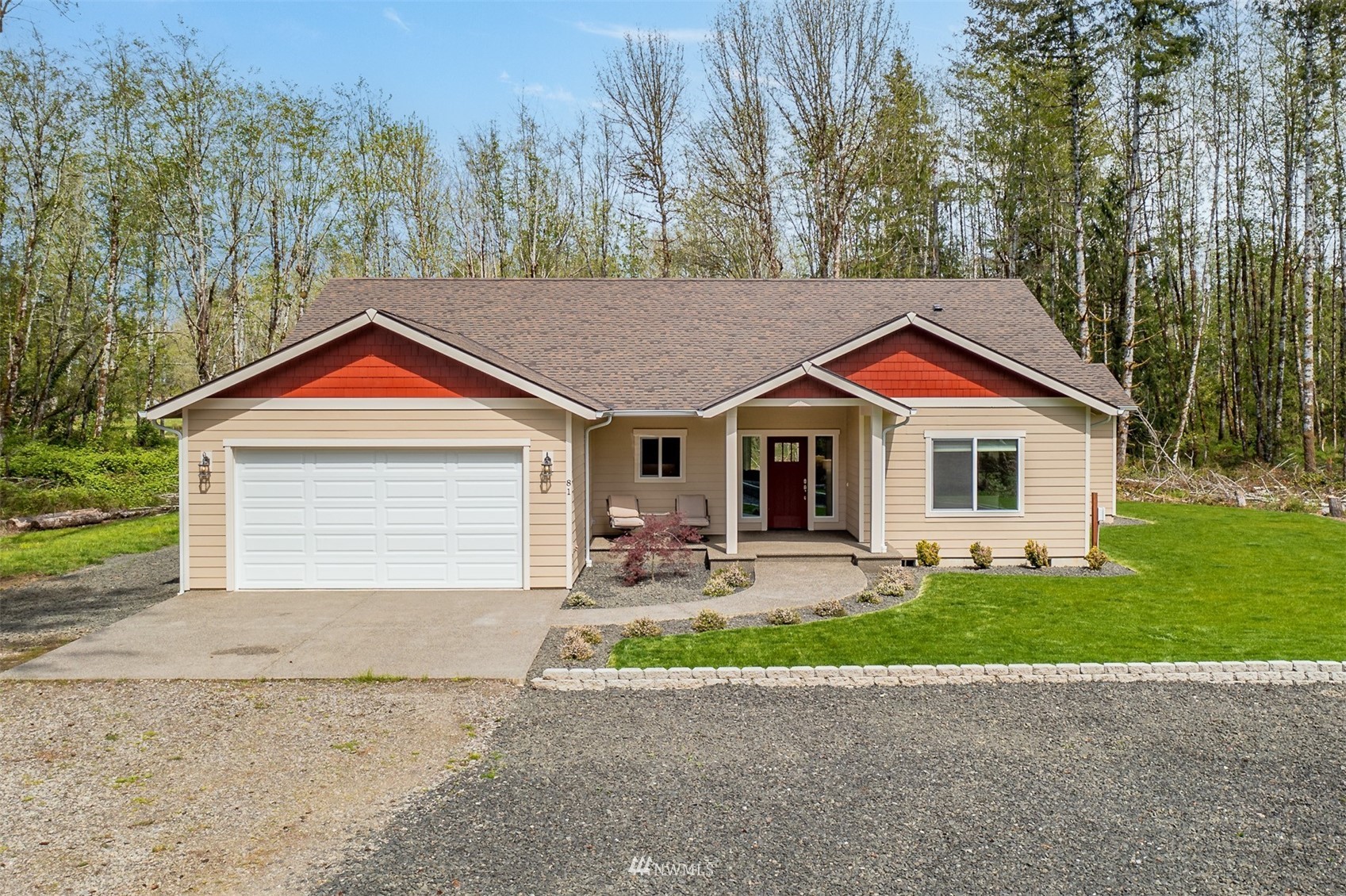 81 East Lighthouse Road Shelton, WA 98584 - Photo 1 of 28 a front view of a house with garden