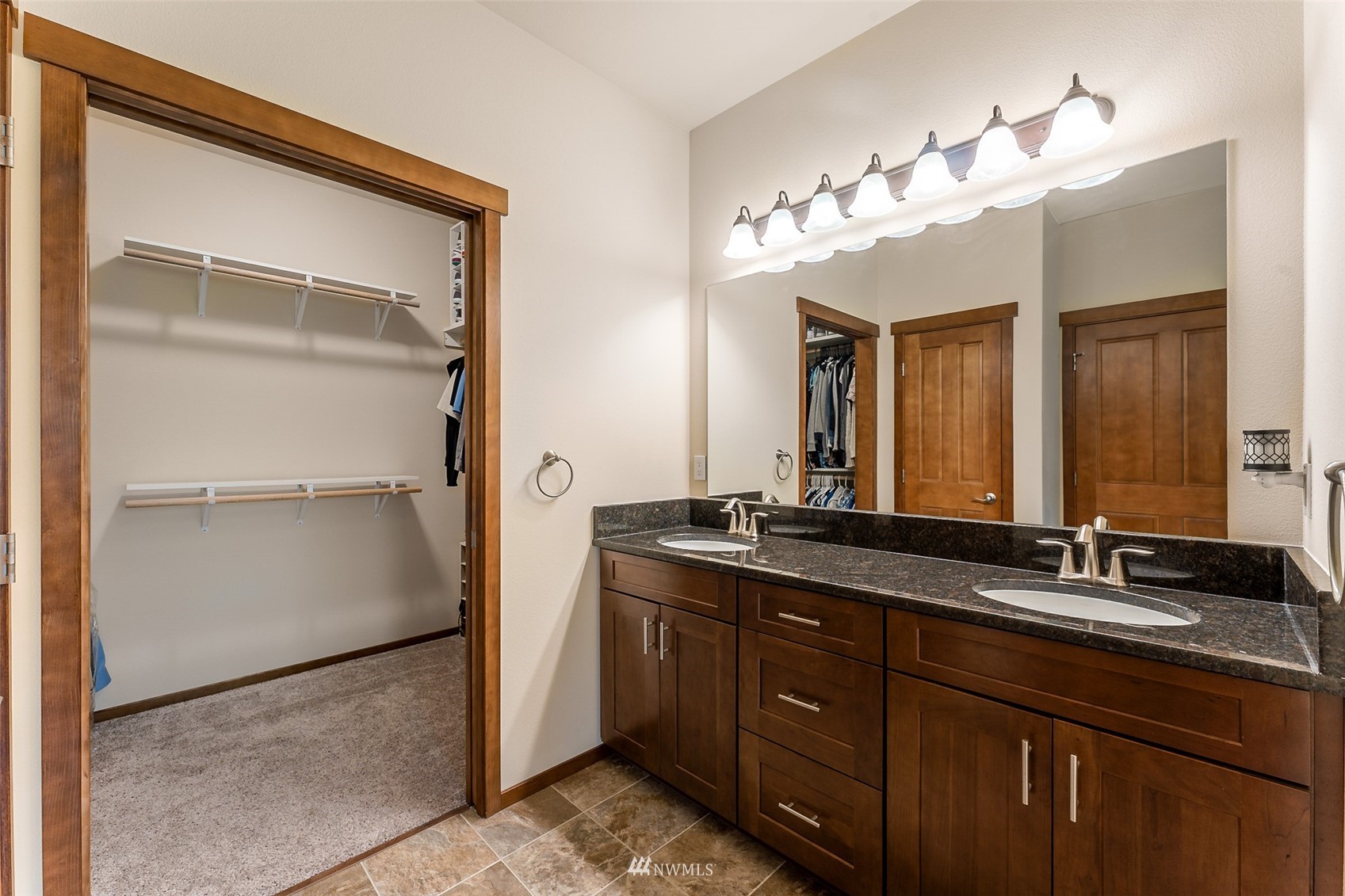 81 East Lighthouse Road Shelton, WA 98584 - Photo 13 of 28 a bathroom with a double vanity sink and a mirror