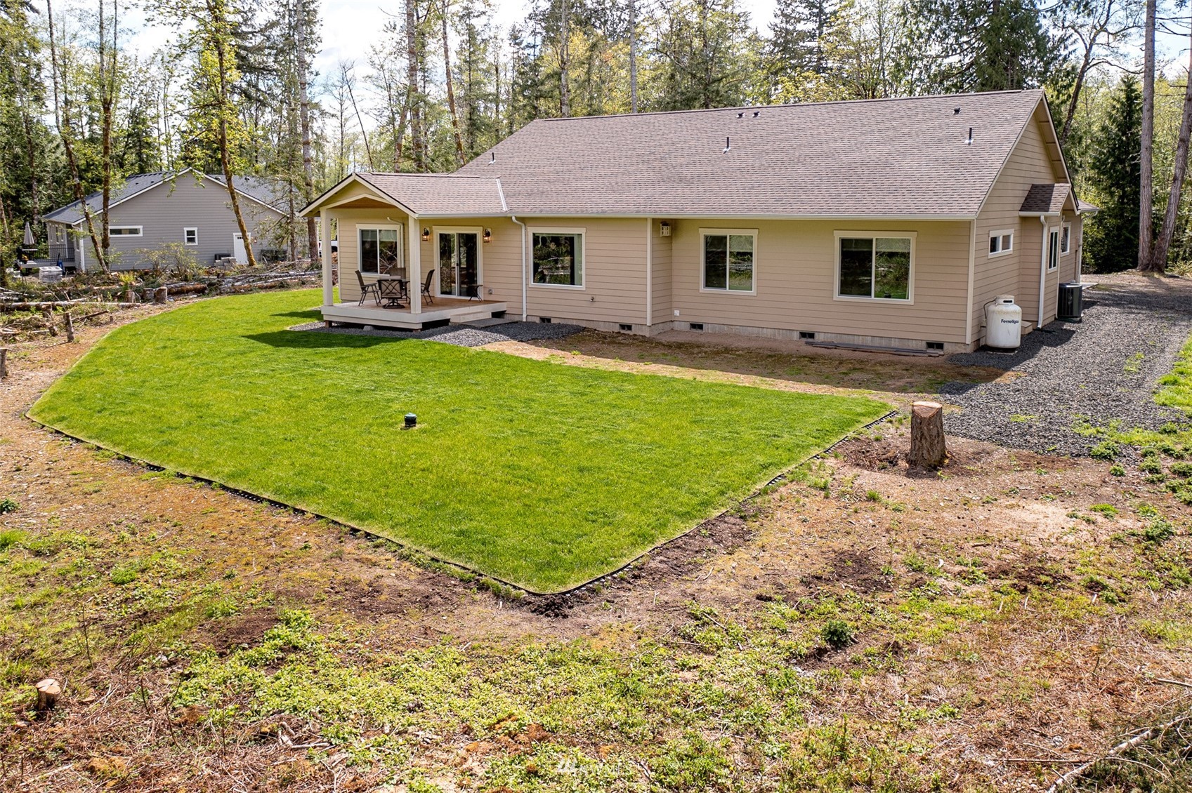 81 East Lighthouse Road Shelton, WA 98584 - Photo 21 of 28 a front view of a house with garden