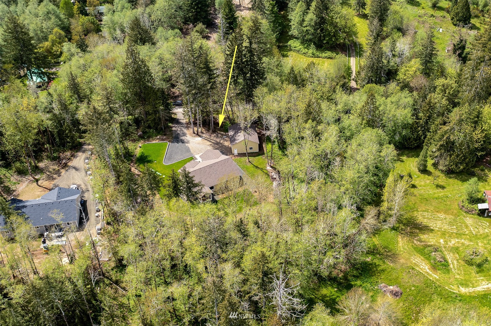 81 East Lighthouse Road Shelton, WA 98584 - Photo 28 of 28 an aerial view of residential house with swimming pool and green space