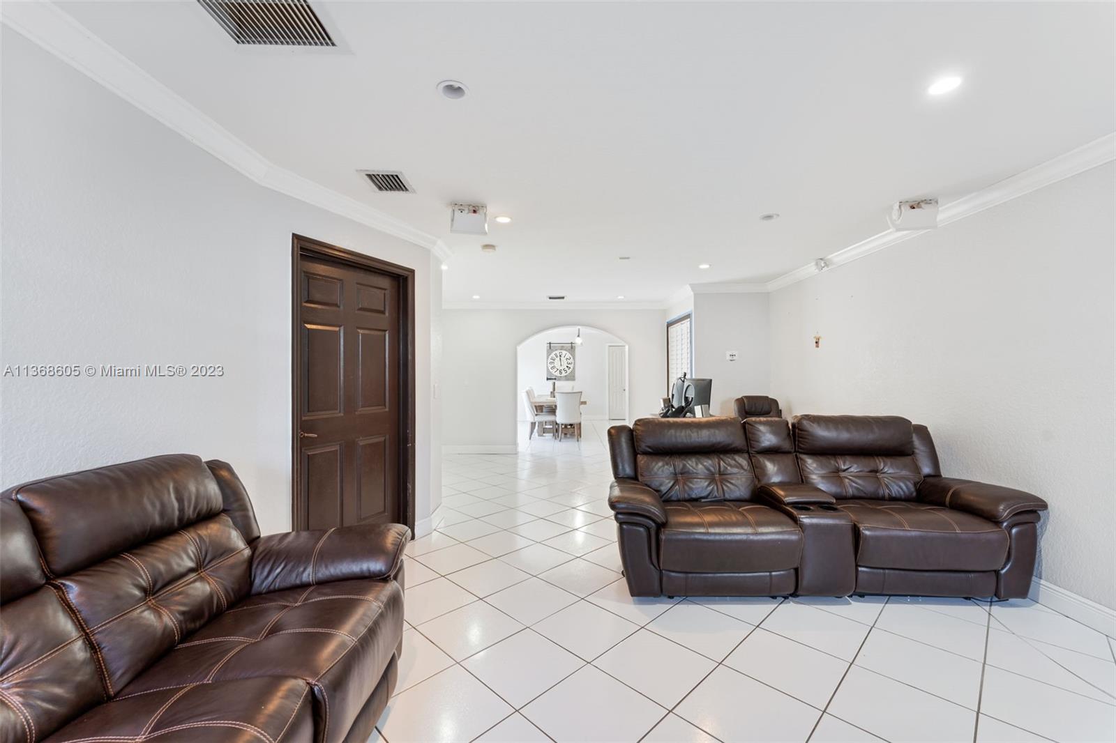 Hialeah Hialeah, FL 33014 - Photo 19 of 32 a living room with furniture