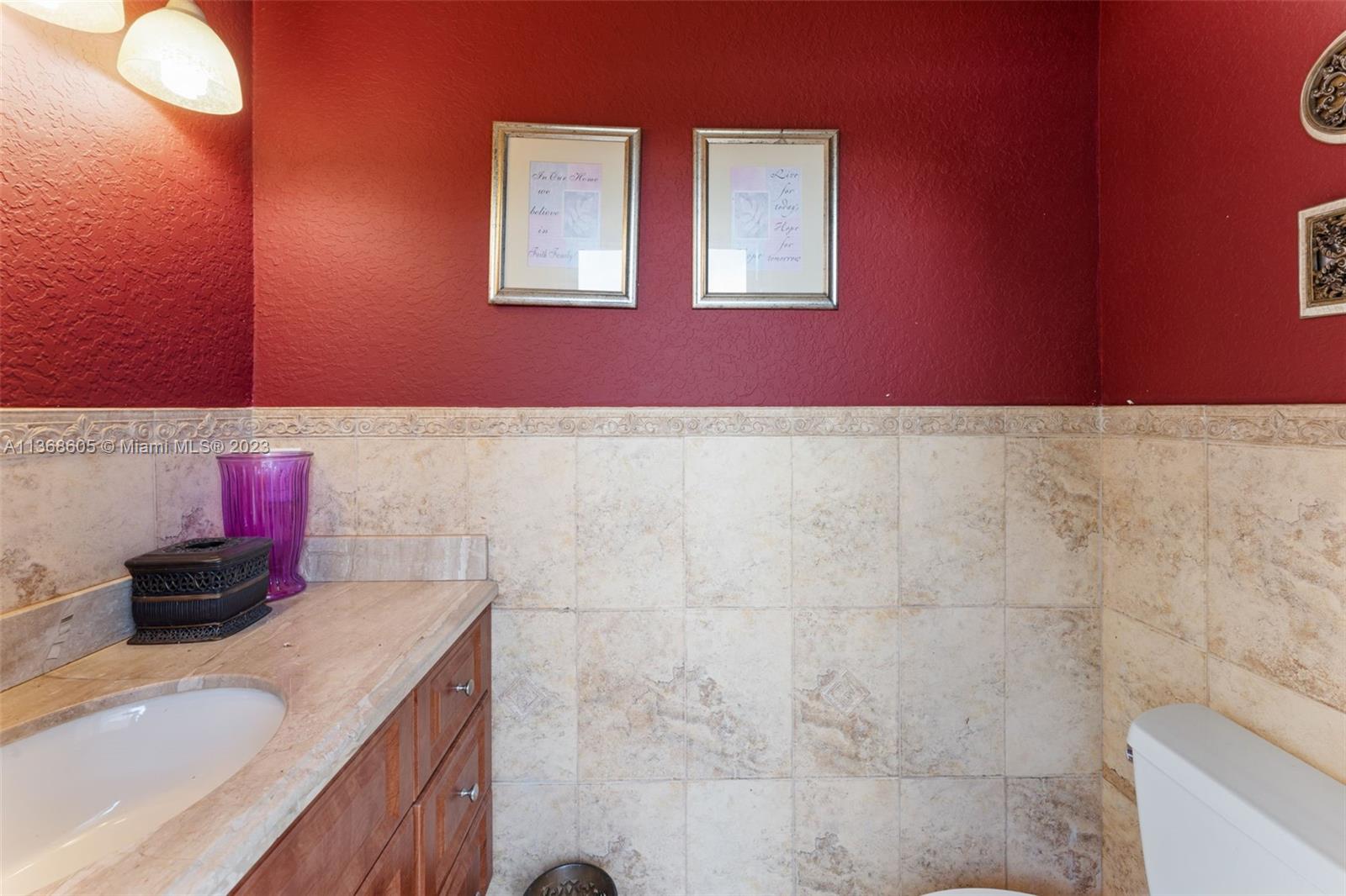 Hialeah Hialeah, FL 33014 - Photo 22 of 32 a bathroom with a sink and a mirror