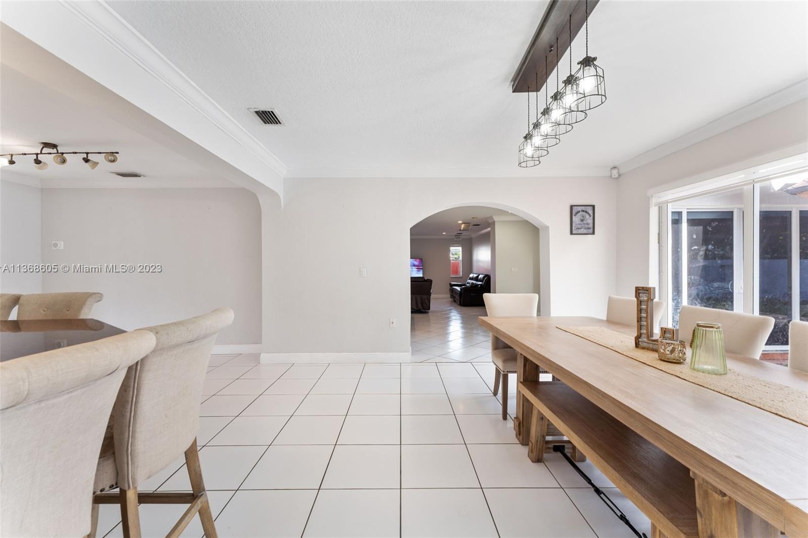 Hialeah Hialeah, FL 33014 - Photo 4 of 32 a room with a sink and a mirror