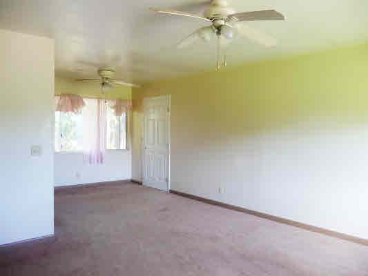 6381 Puupilo Road Kapaa, HI 96746 - Photo 3 of 13 an empty room with a window