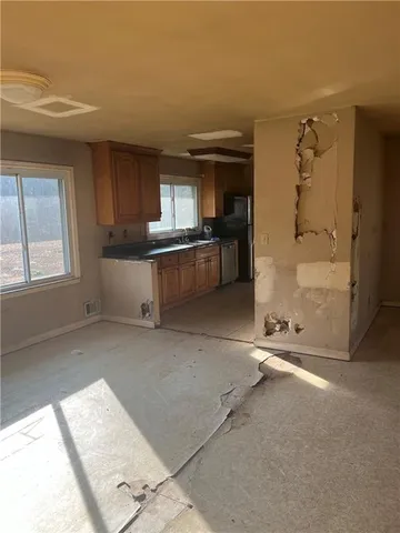 a view of a kitchen with a sink
