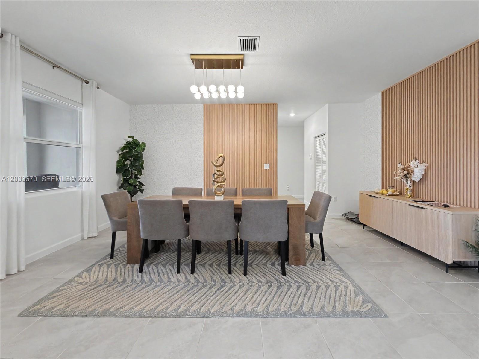 13218 Southwest 189th Terrace Miami, FL 33177 - Photo 24 of 47 a view of a dining room with furniture