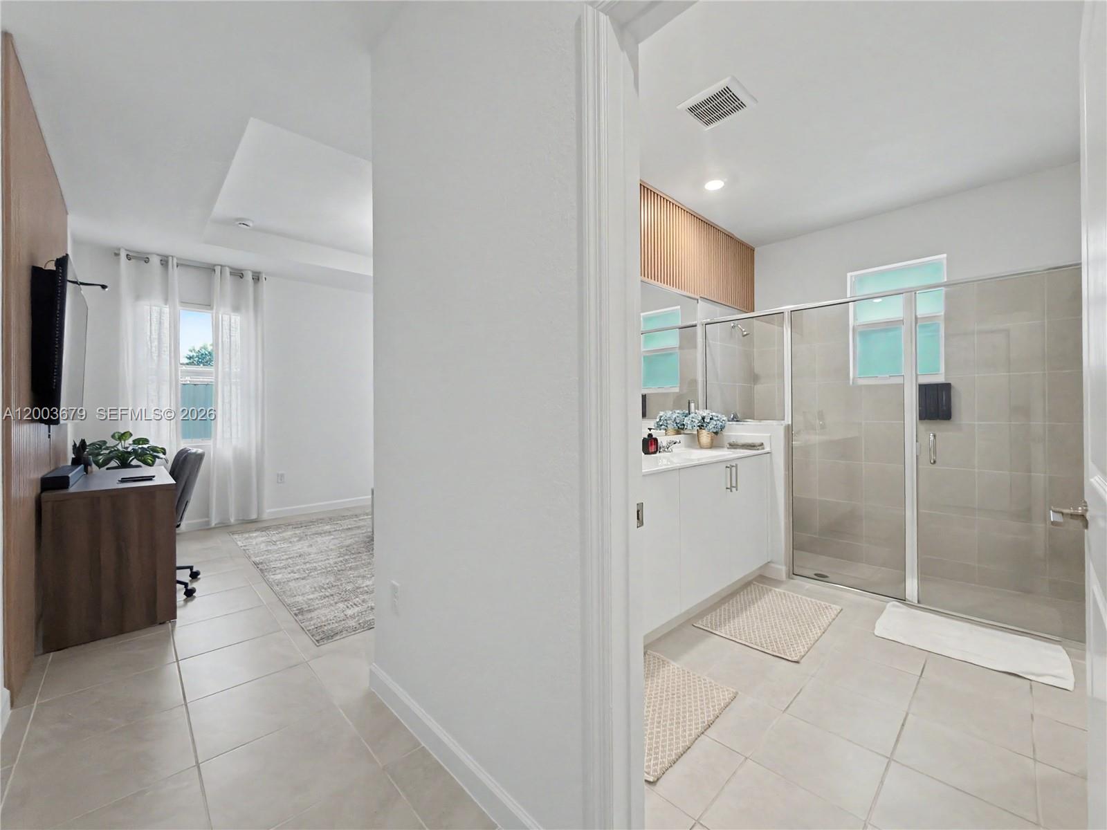 13218 Southwest 189th Terrace Miami, FL 33177 - Photo 30 of 47 a bathroom with a sink a toilet and shower