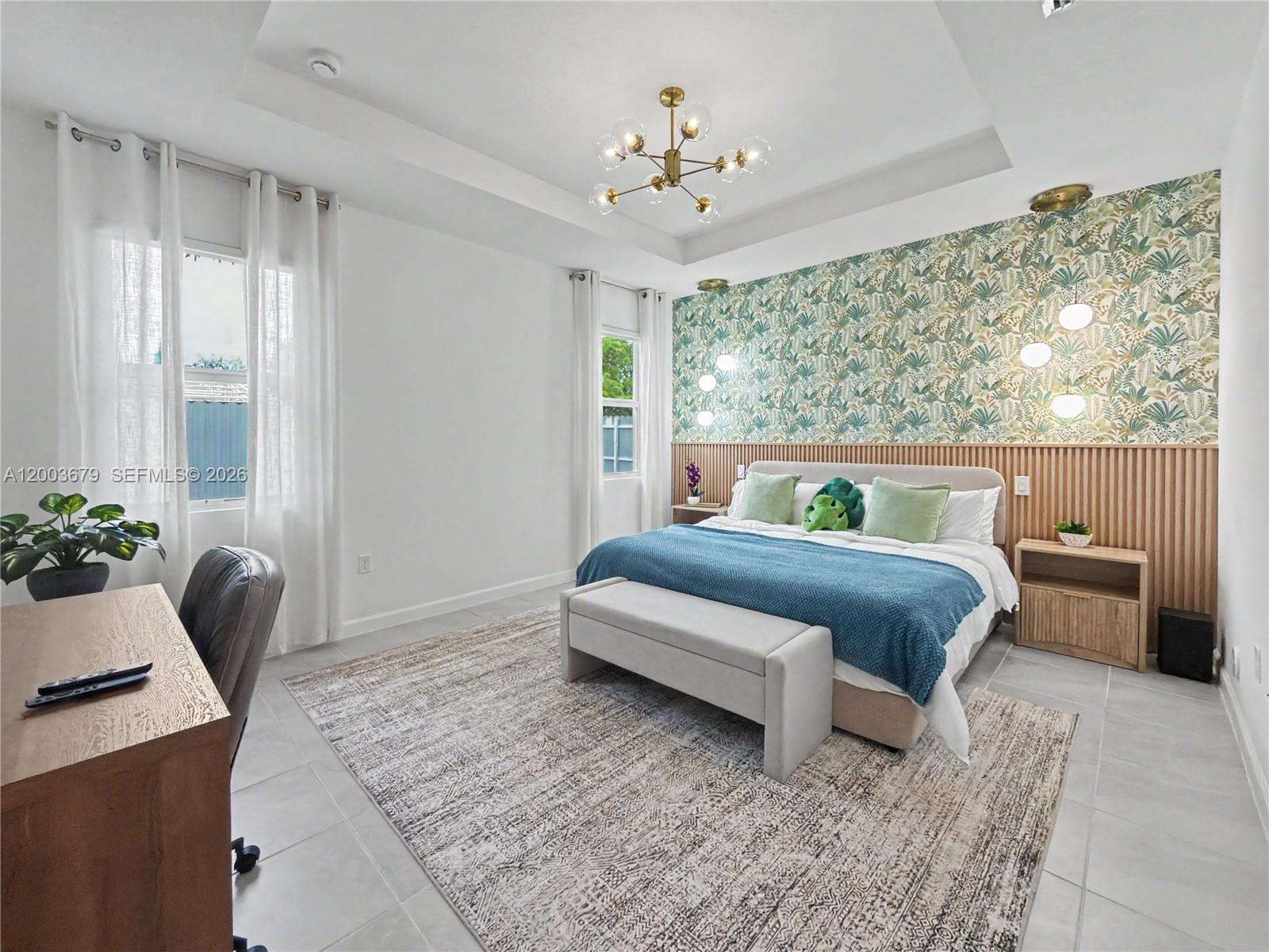 13218 Southwest 189th Terrace Miami, FL 33177 - Photo 34 of 47 a bedroom with a bed and glass window