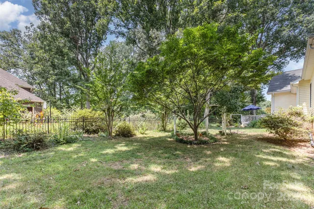a view of backyard with green space