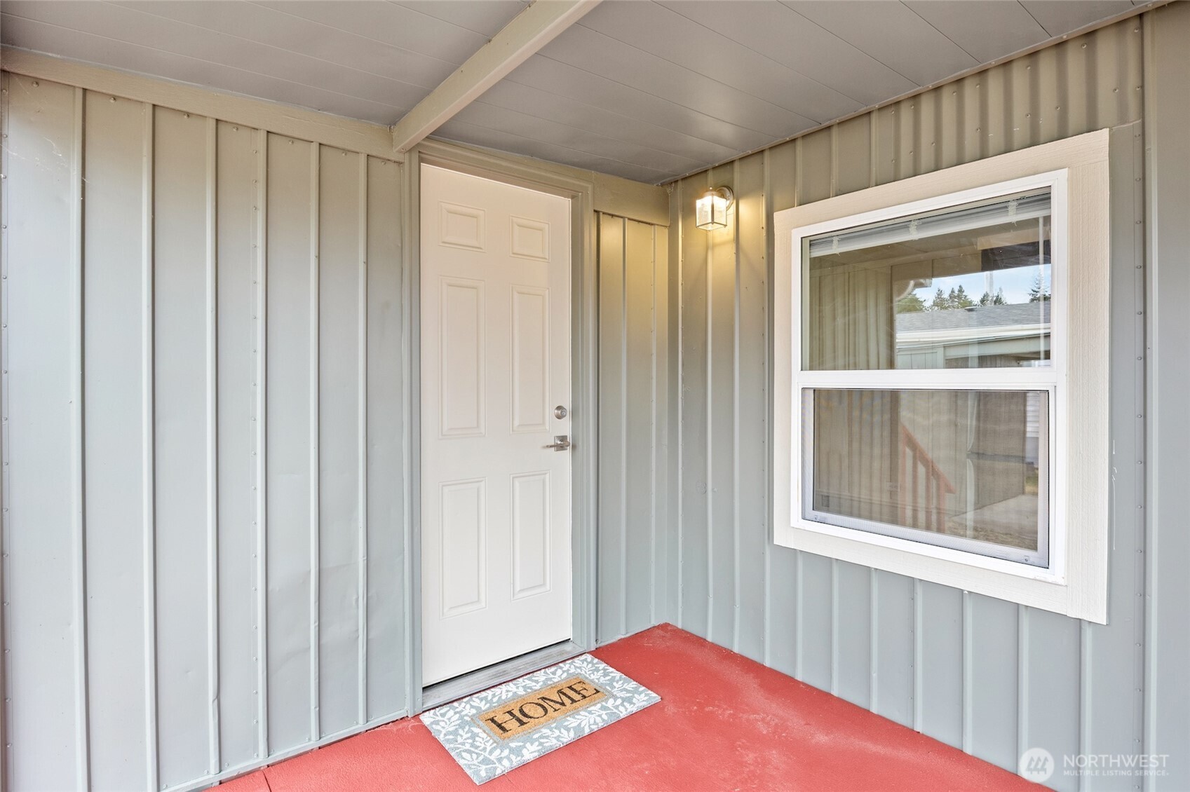 8915 Wilkensen Road Southeast, Unit 3 Yelm, WA 98597 - Photo 4 of 16 a view of an empty room and window