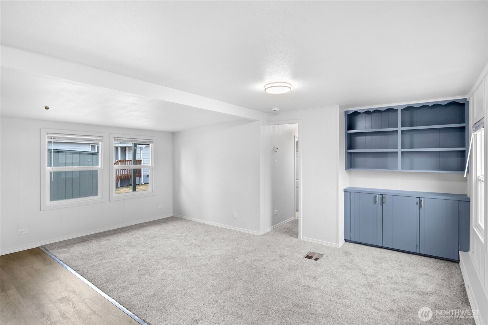 8915 Wilkensen Road Southeast, Unit 3 Yelm, WA 98597 - Photo 10 of 16 a view of an empty room with a window
