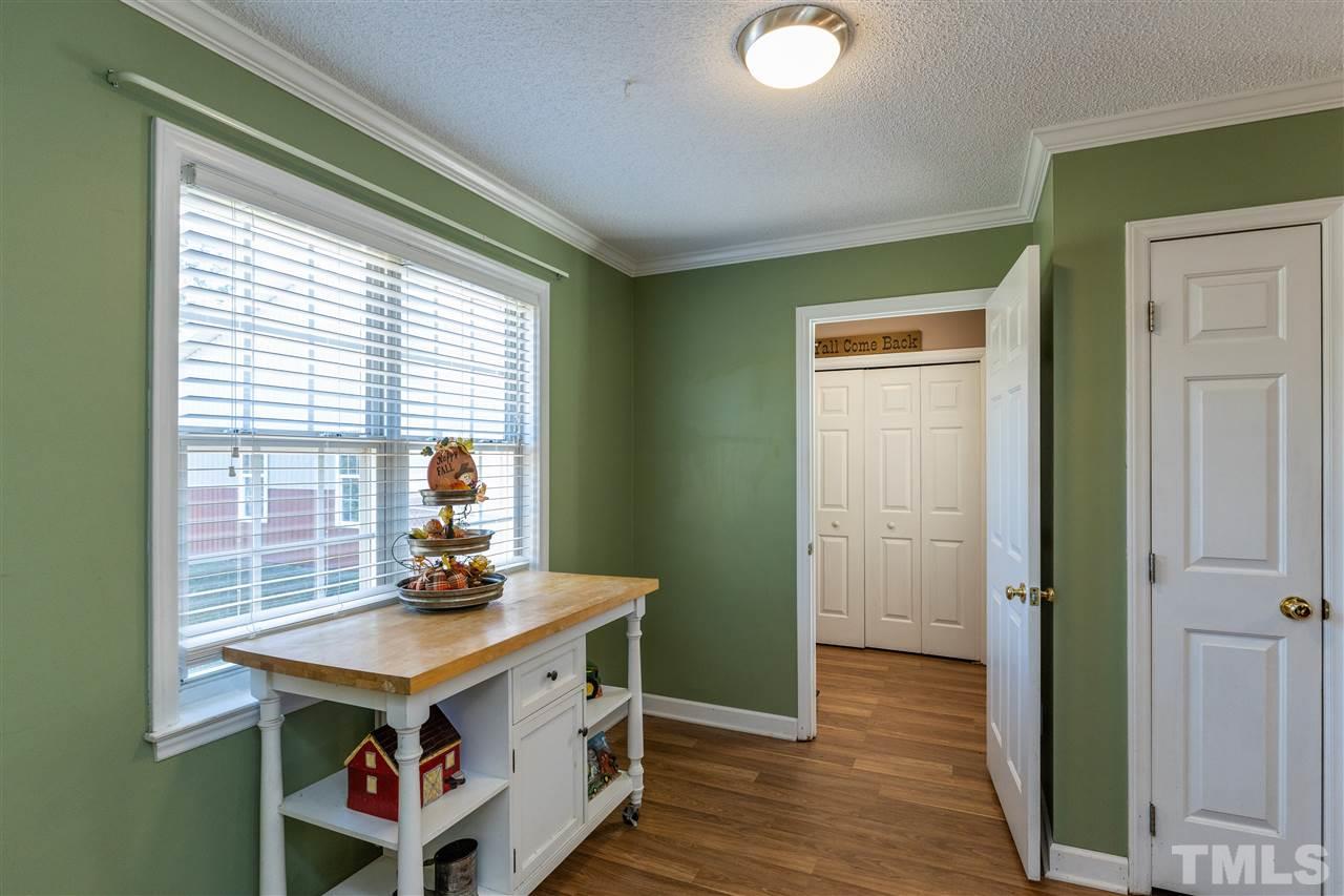 103 Holly Ranch Court Willow Spring, NC 27592 - Photo 10 of 30 a view of a room with furniture and window
