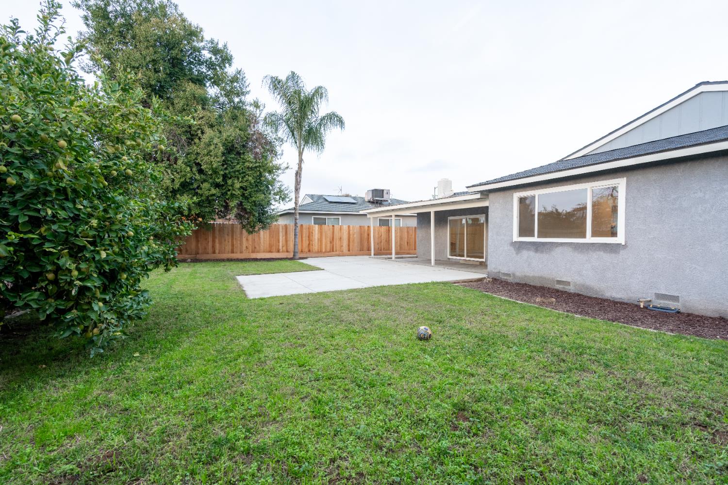 2612 Renn Avenue Clovis, CA 93611 - Photo 28 of 36 a view of a house with a backyard