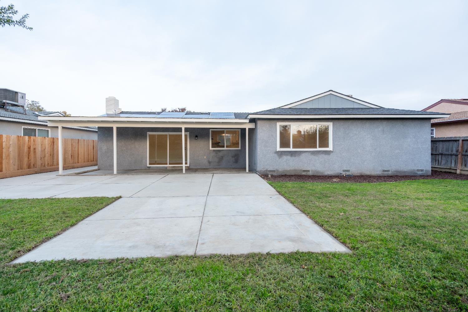 2612 Renn Avenue Clovis, CA 93611 - Photo 29 of 36 a front view of house with yard and green space