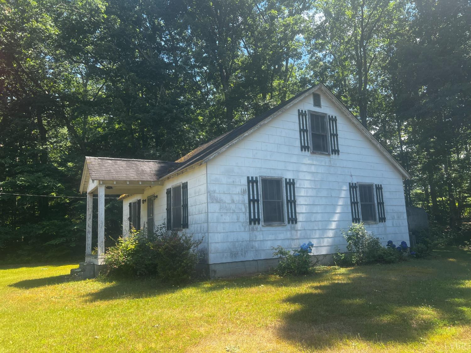 1131 Cody Road Nathalie, VA 24577 - Photo 2 of 28 a view of a house with pool and yard