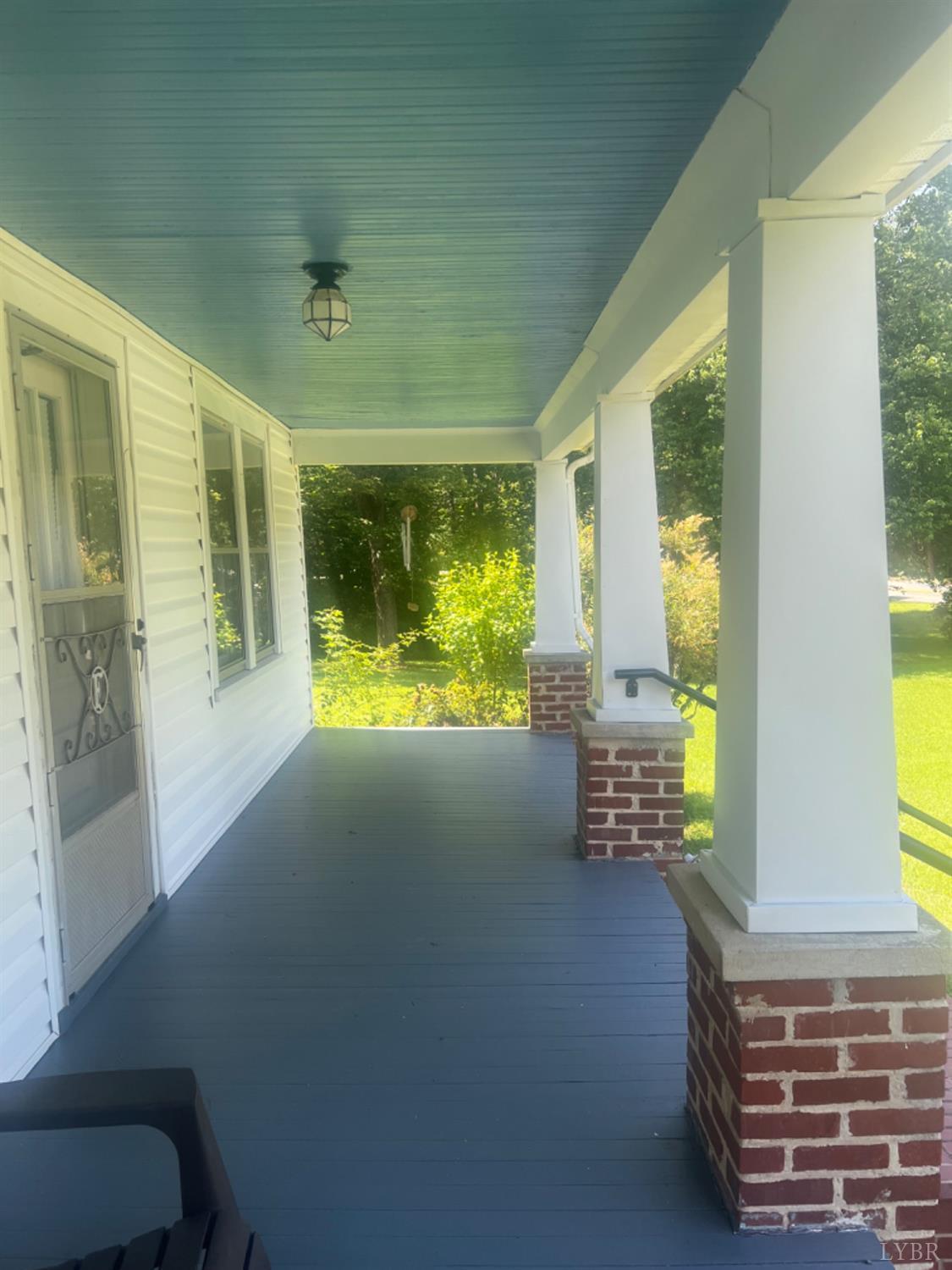 1131 Cody Road Nathalie, VA 24577 - Photo 3 of 28 a view of room with window and front door