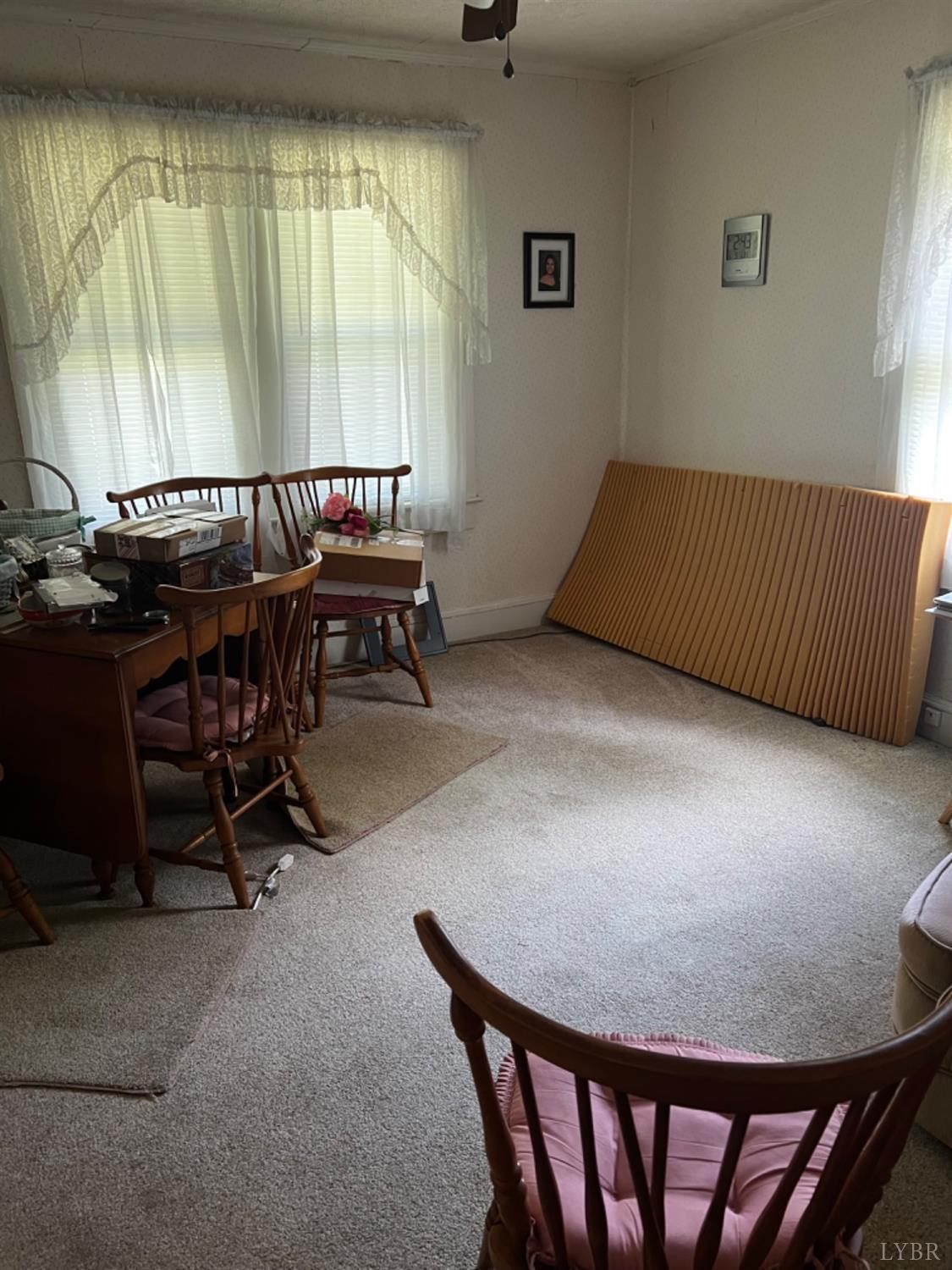 1131 Cody Road Nathalie, VA 24577 - Photo 6 of 28 a view of a workspace with furniture and window
