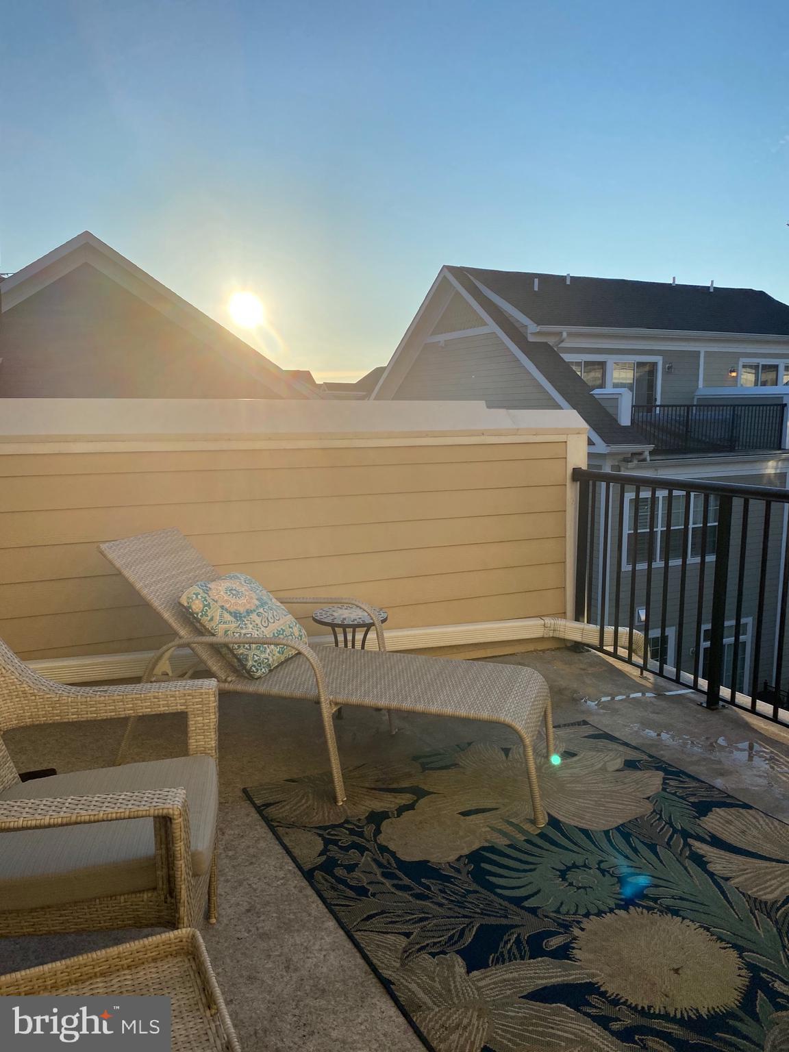 81 Linden Place Baltimore, MD 21286 - Photo 54 of 56 a terrace with a table and chairs