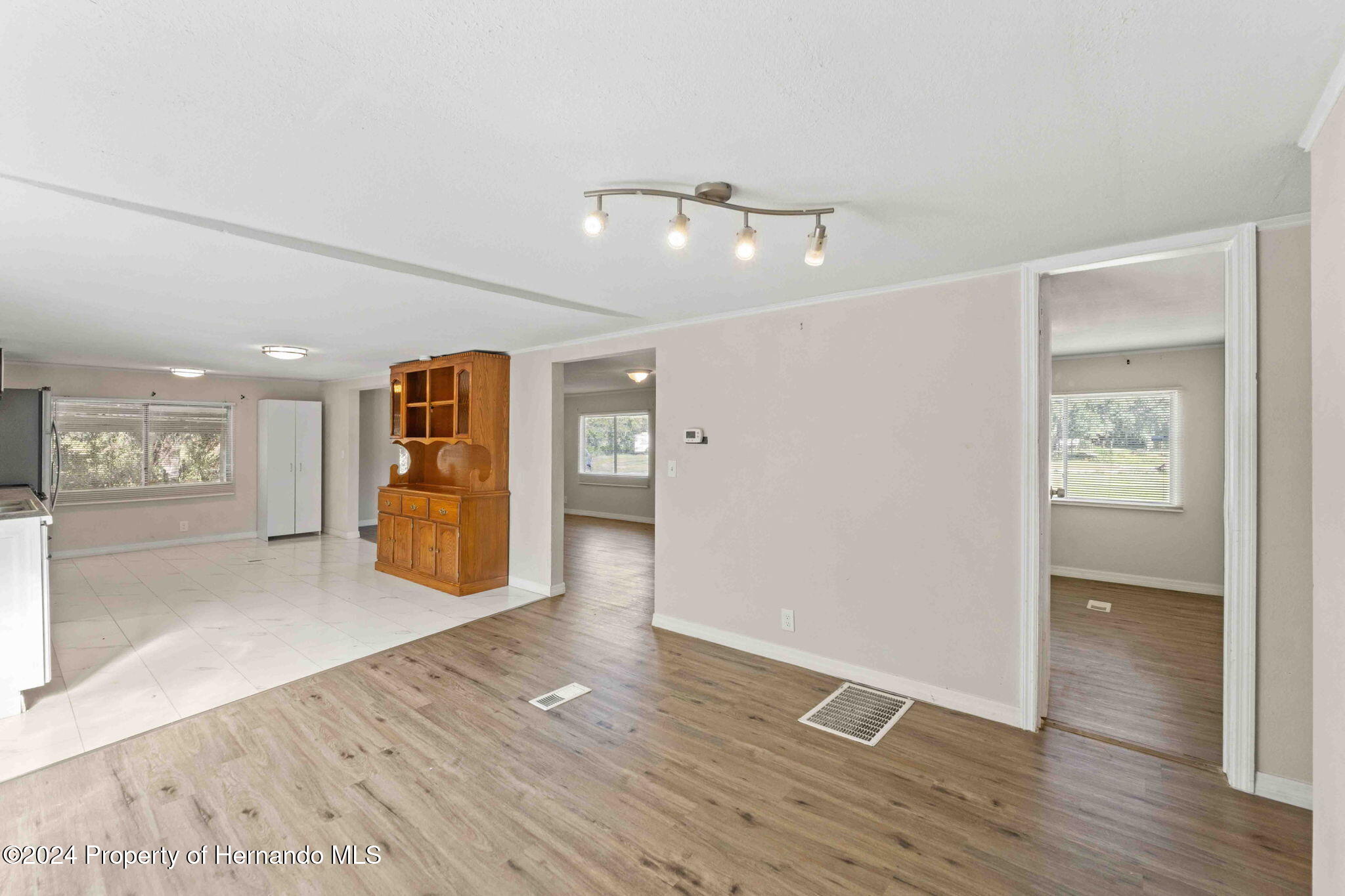 4265 North Beginning Path Crystal River, FL 34428 - Photo 16 of 30 a view of a livingroom with wooden floor