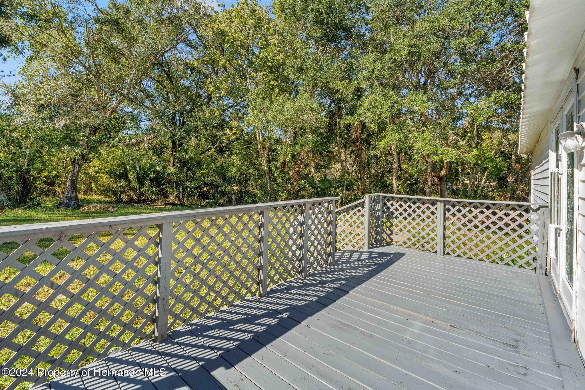 4265 North Beginning Path Crystal River, FL 34428 - Photo 27 of 30 a balcony with a wooden floor