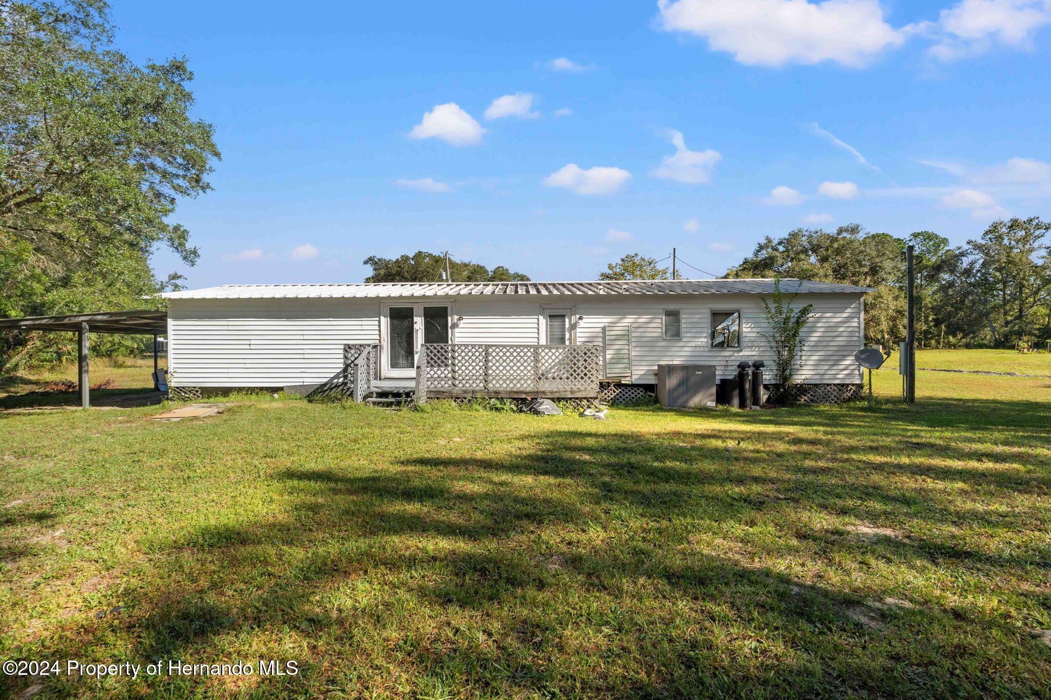 4265 North Beginning Path Crystal River, FL 34428 - Photo 28 of 30 a front view of a house with a garden