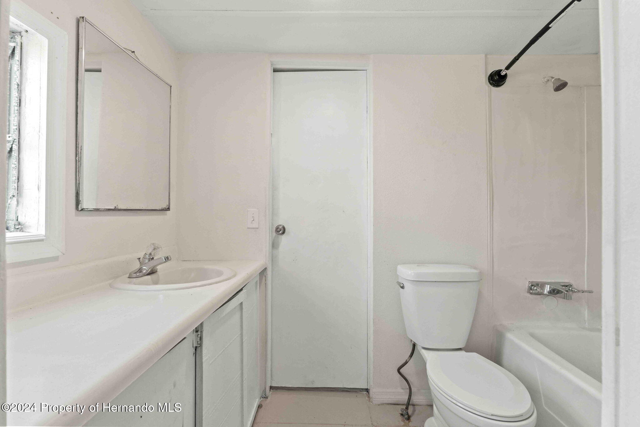 4265 North Beginning Path Crystal River, FL 34428 - Photo 10 of 30 a bathroom with a sink a toilet and shower