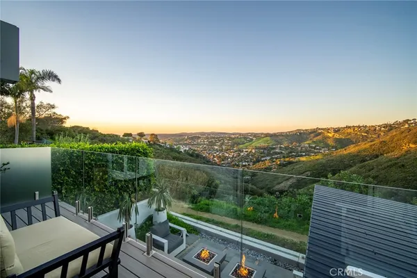 a view of a balcony with mountain view