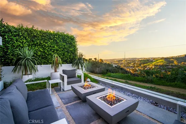 a view of a terrace with sitting area