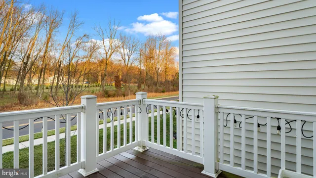 a view of a brick house with a large window