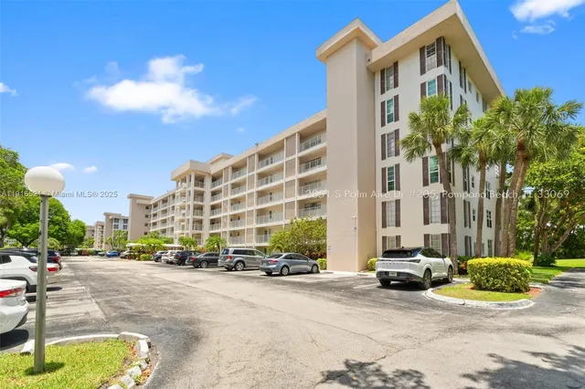 a view of a street with cars
