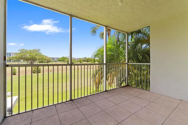 a view of swimming pool with a yard