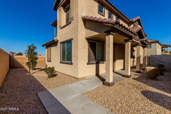 a view of a house with a patio