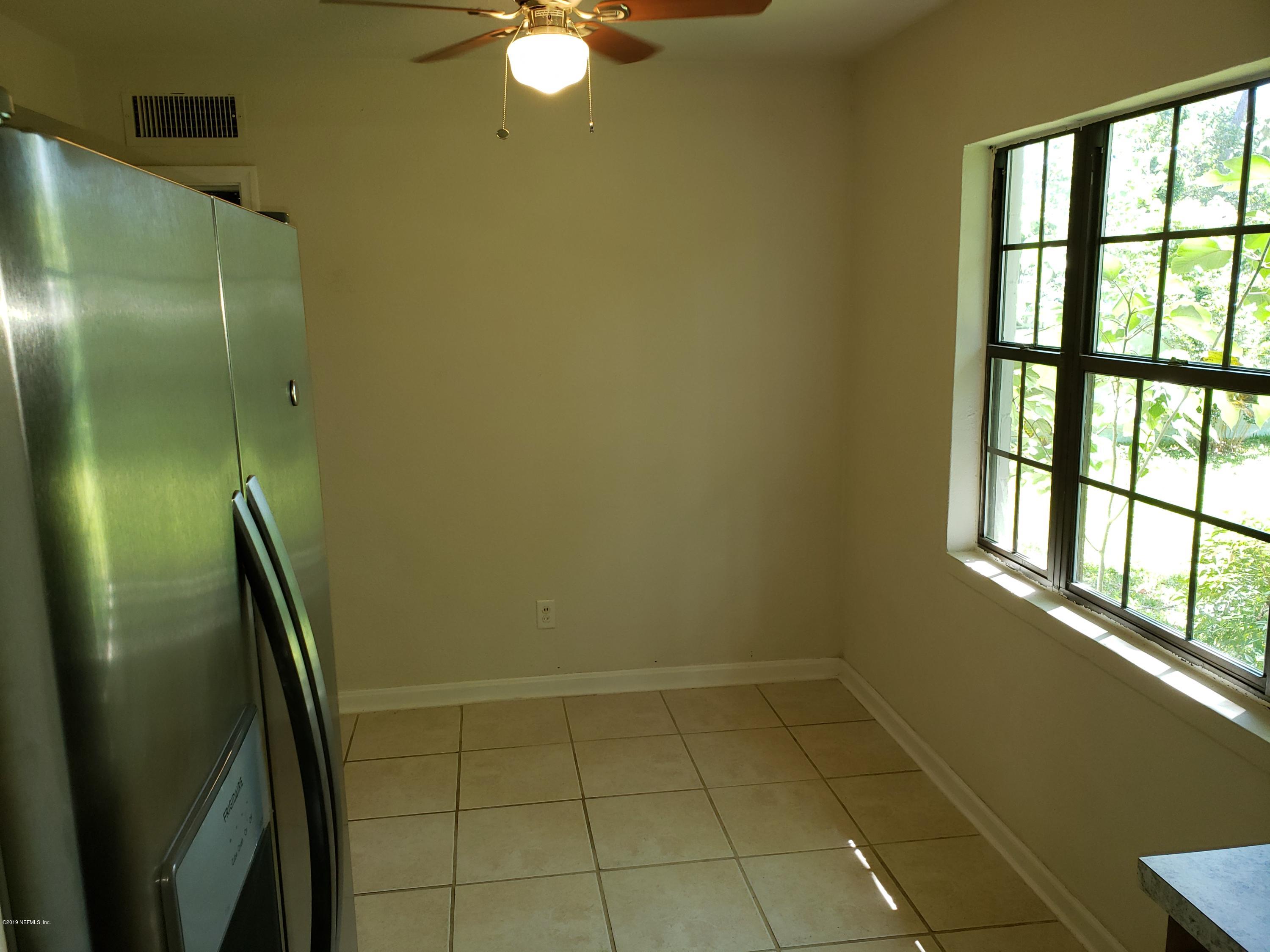 7110 Oakney Road Jacksonville, FL 32211 - Photo 4 of 15 a bathroom with a shower