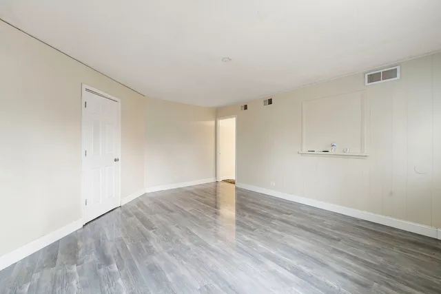 a backyard of a house with lots of green space