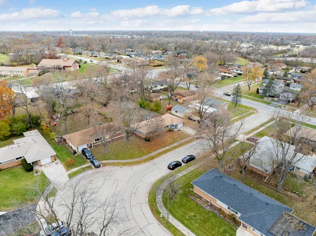 a view of a city with mountains in the background