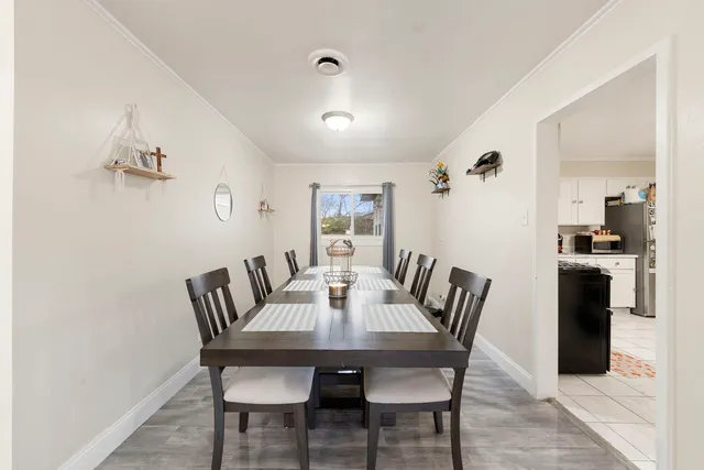 a view of a dining room with furniture