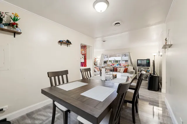 a view of a dining room with furniture